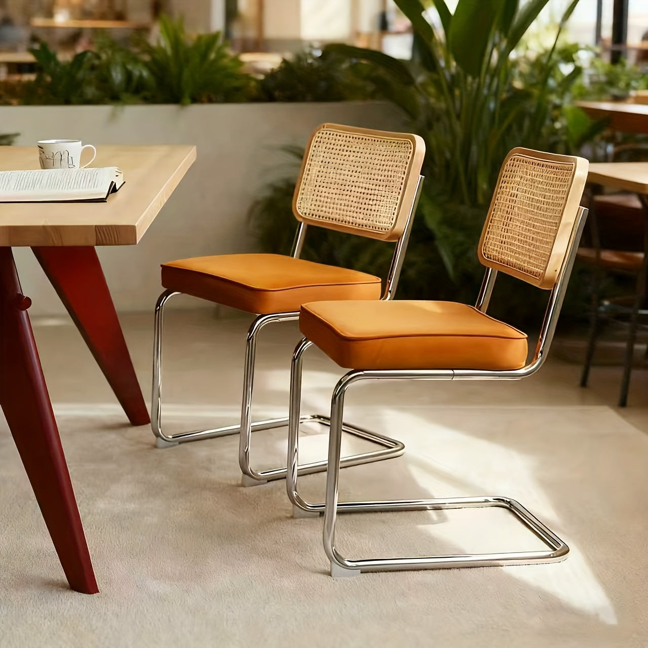 Set of Two Dining Chairs Featuring Velvet And Rattan, Designed with Chrome Legs. These Modern Mid-Century Breuer-Style Chairs Are Upholstered And Suitable for Dining, Living Rooms, Or Kitchens